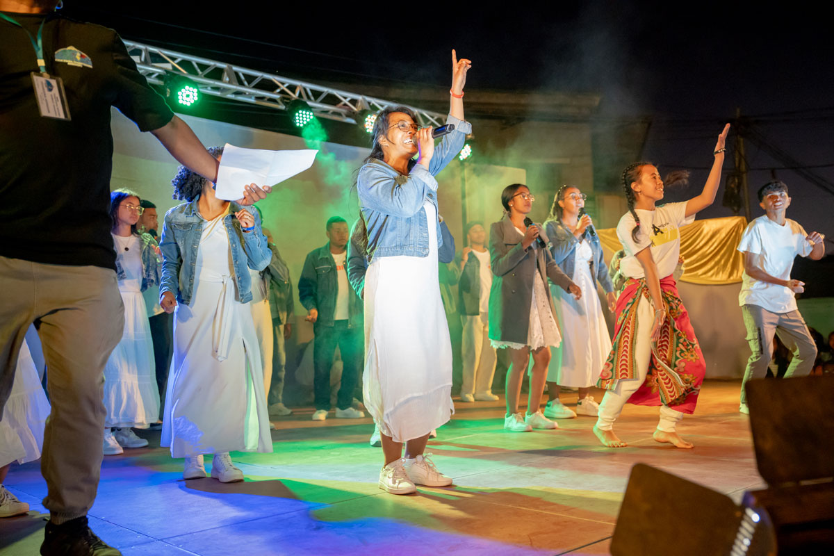 People performing on stage at the Sihanaka Bible dedication.